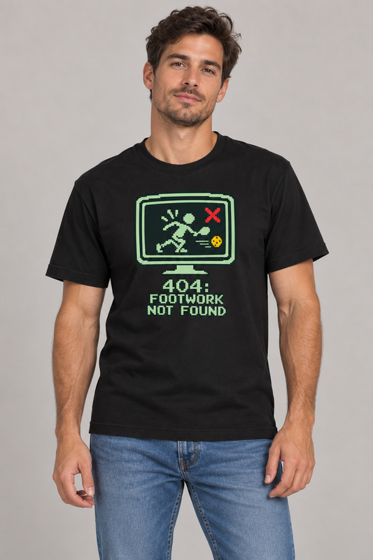 Male model wearing 404 Footwork Not Found Pickleball T-Shirt