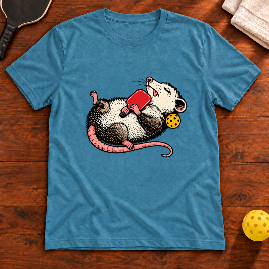 Between Games Possum Pickleball T-Shirt flat lay mockup