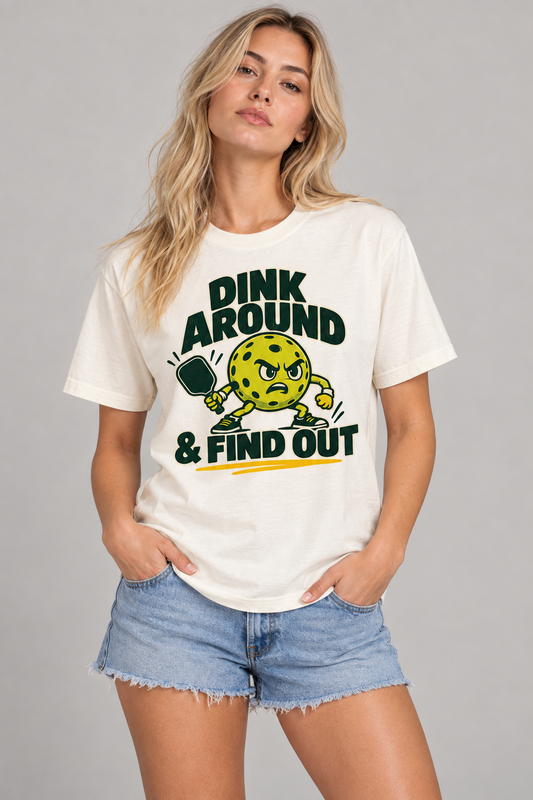 Model wearing Dink Around and Find Out Pickleball T-Shirt