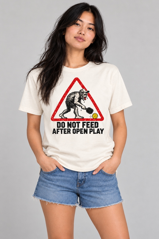 Portrait studio model wearing Do Not Feed After Open Play Pickleball T-Shirt
