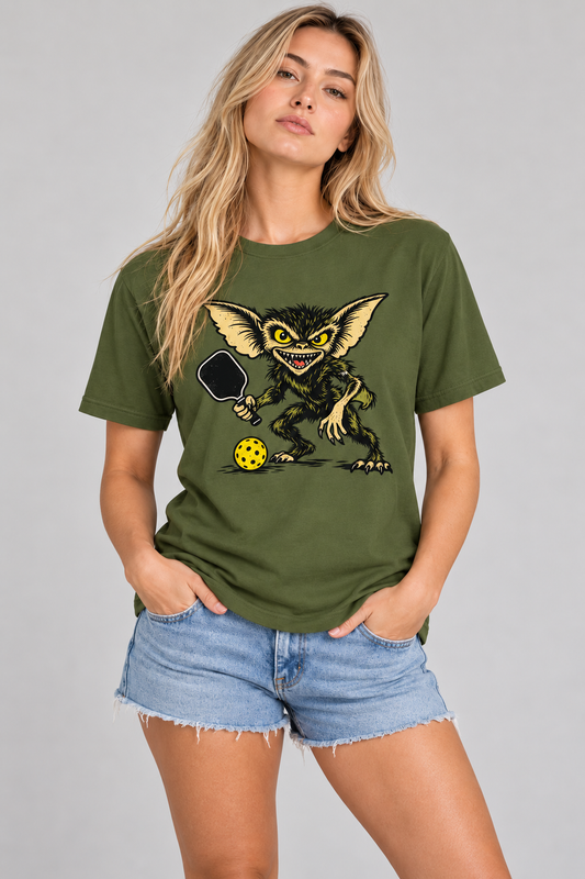 Portrait studio model wearing olive Pickleball Gremlin T-Shirt