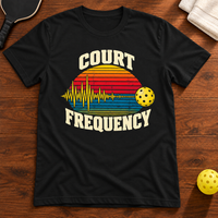 Court Frequency Pickleball T-Shirt, black, warm wood flat lay