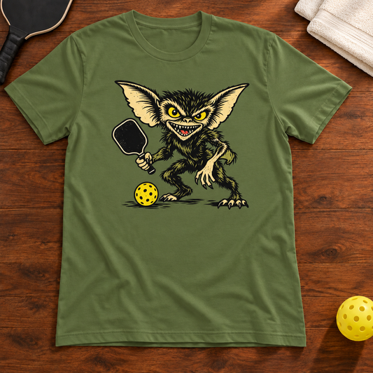 Pickleball Gremlin T-Shirt, olive, warm wood flat lay