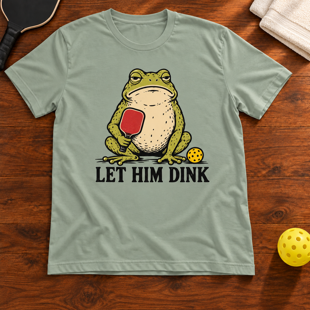 Let Him Dink Frog Pickleball T-Shirt, sage, warm wood flat lay