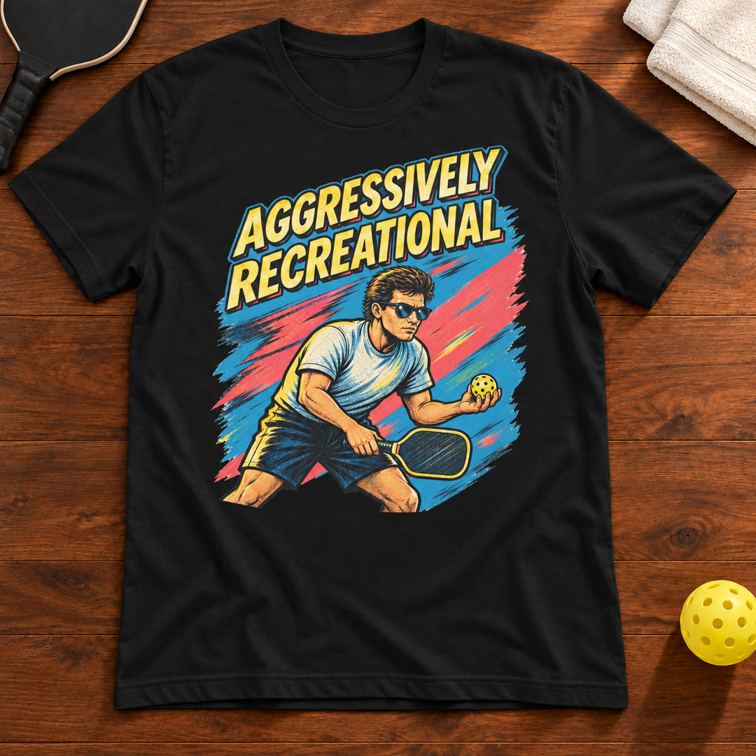 Aggressively Recreational Pickleball T-shirt, black, warm wood flat lay