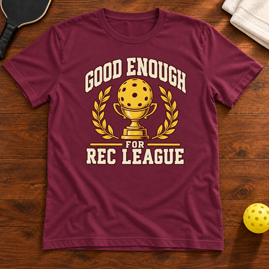 Good Enough for Rec League Pickleball T-Shirt, maroon, warm wood flat lay